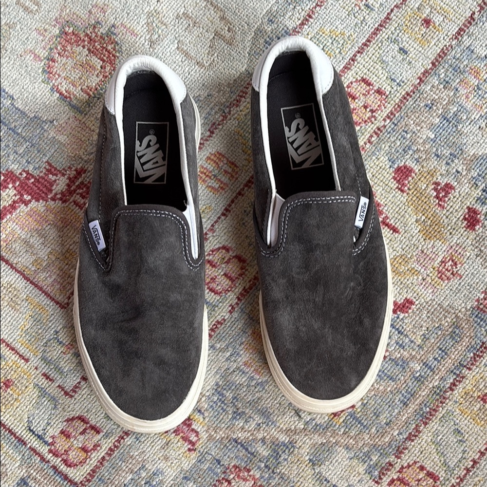 Vans Black and White Classic Slip-On Sneakers